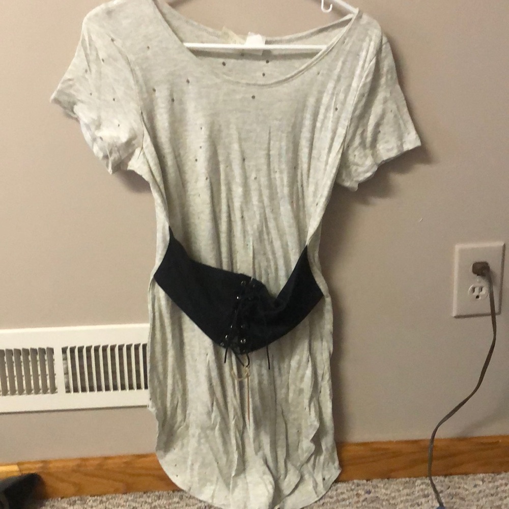 Long grey shirt w/ built on black belt over waist